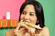 Woman eating Mexican food