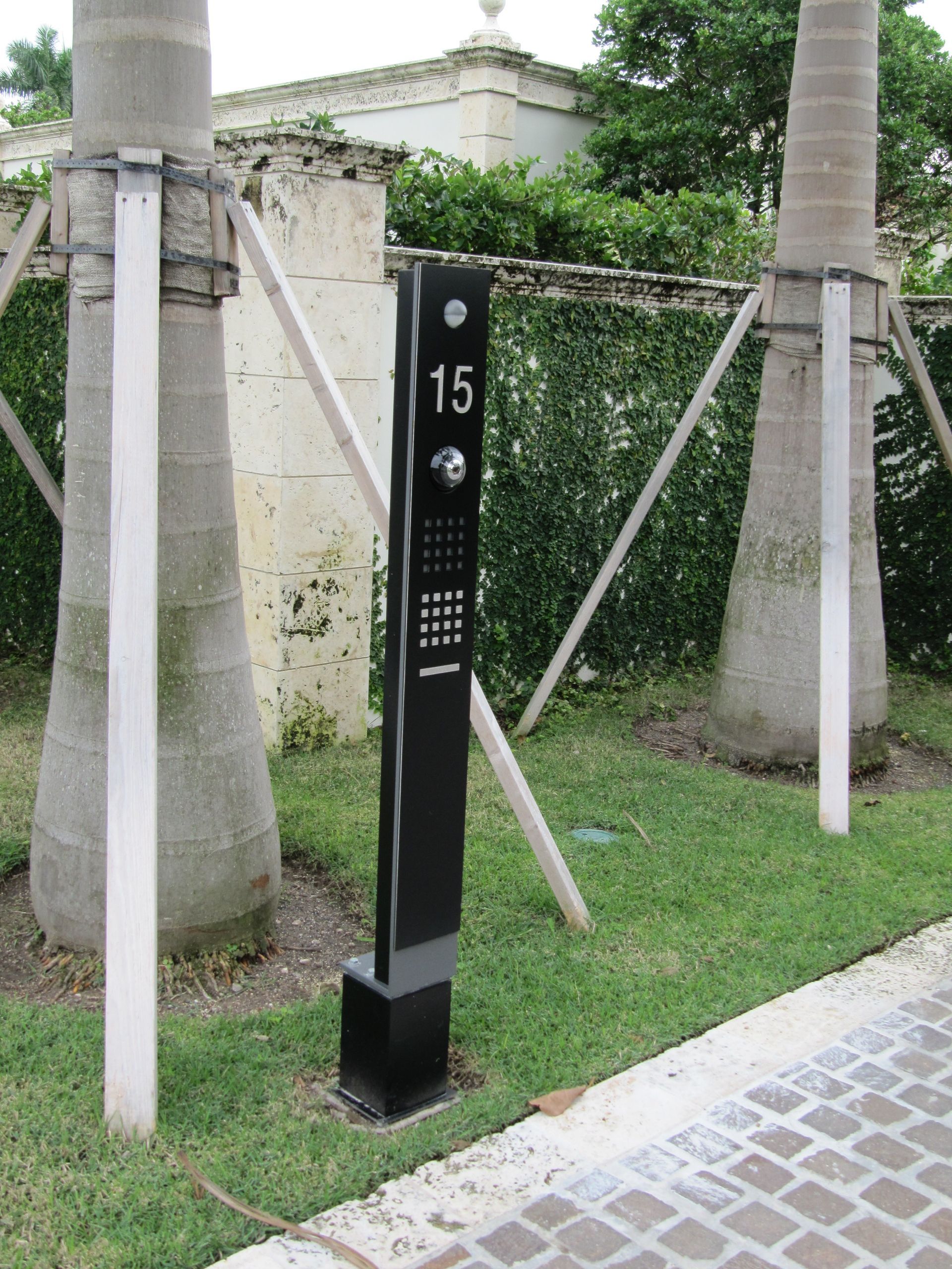 a black pole with the number 15 on it