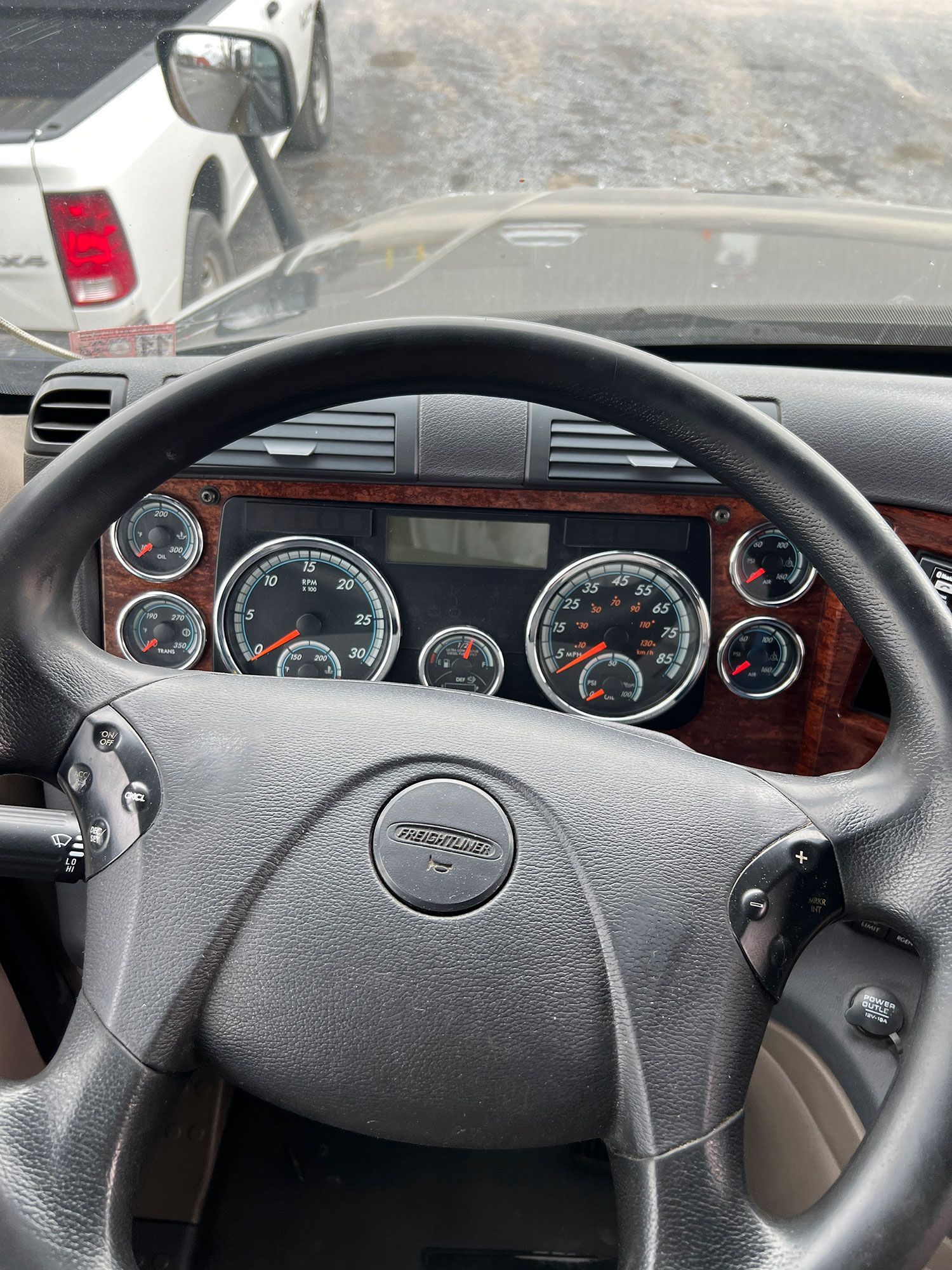 A close up of a steering wheel