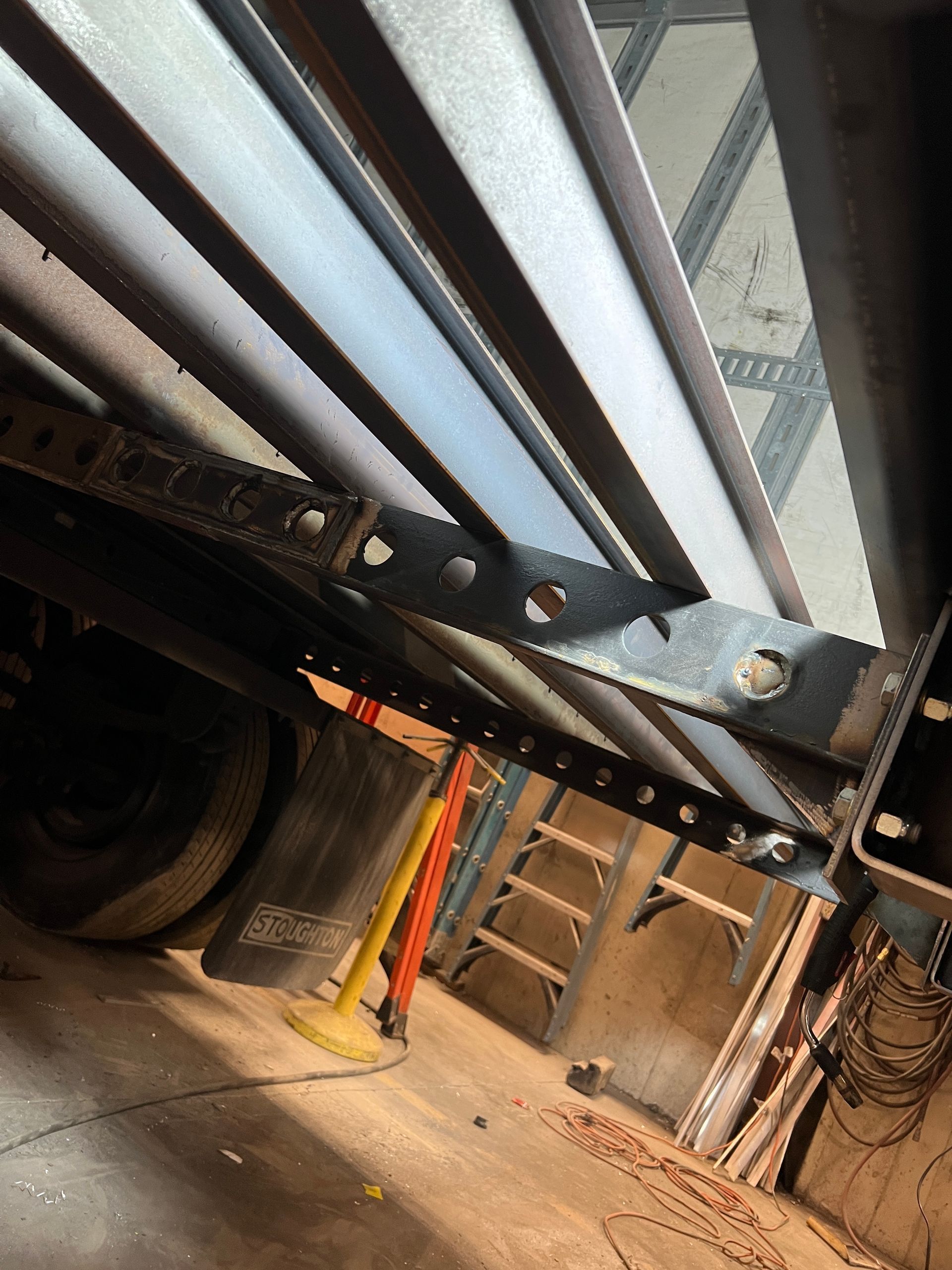 A close up of a metal structure in a garage.