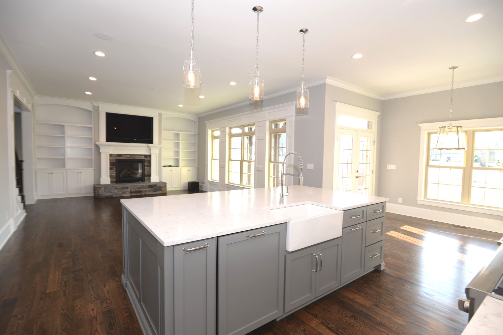 There is a large island in the middle of the kitchen.