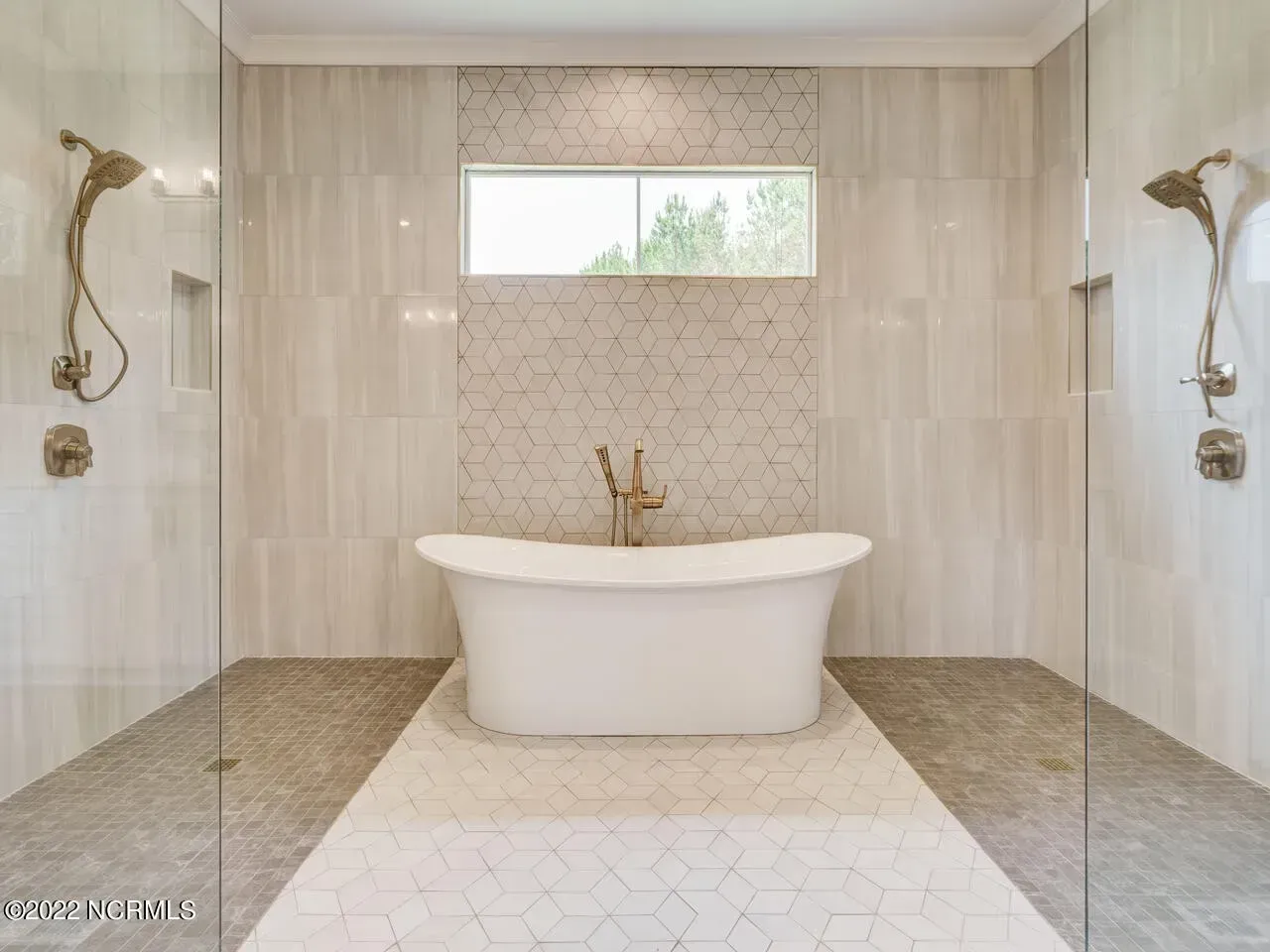 There is a bathtub in the middle of the bathroom.