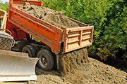 Construction truck piling soil