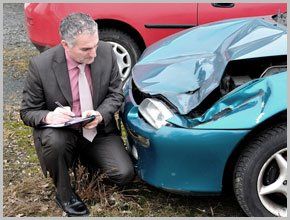 Man check a wreck car