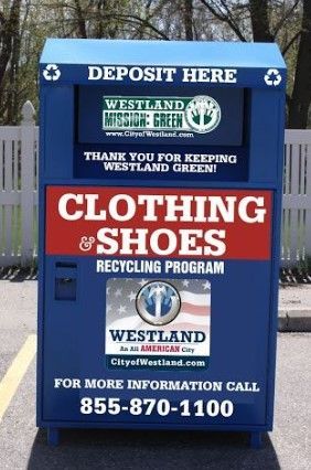 a blue recycling bin