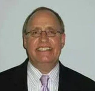 Photo of {{Team Member Name}}