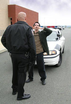Police and drunk man
