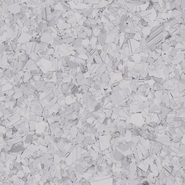 Close-up of light gray and white crumpled paper confetti texture.