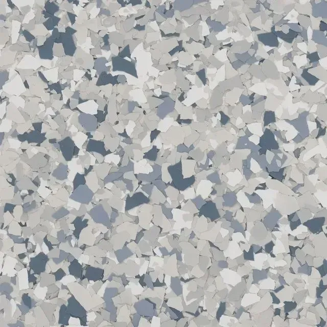 Close-up of a gray, white, and blue speckled terrazzo-like surface.