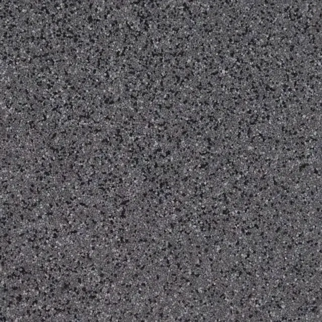 Gray speckled textured surface, close-up.