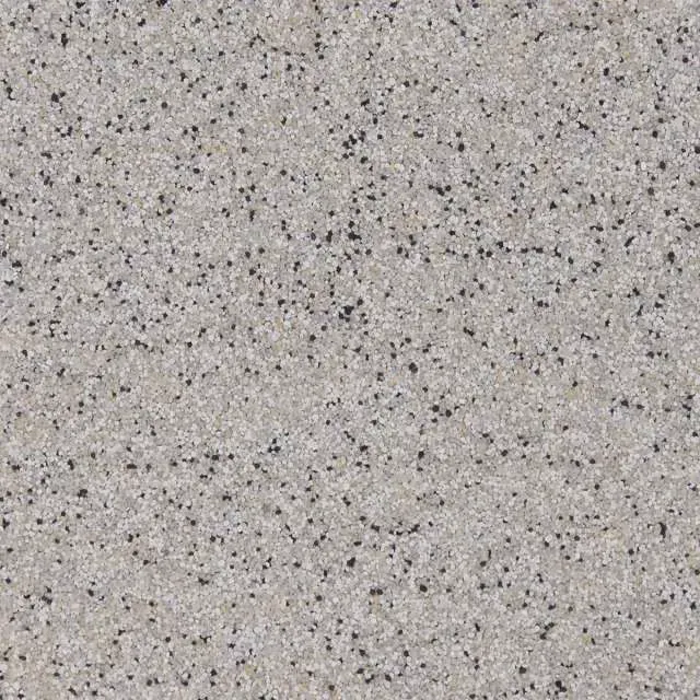 Light gray speckled stone or granite surface with small black flecks.