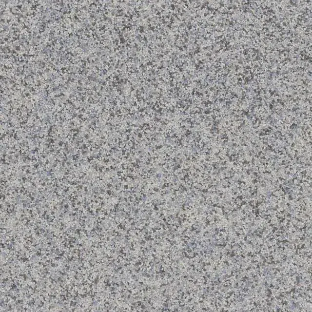Speckled gray granite or stone surface with a fine, mottled texture.