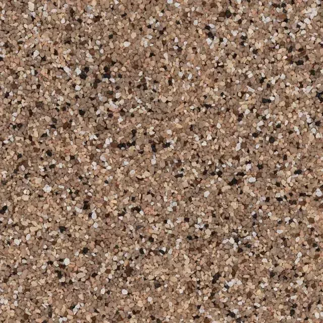 Close-up of brown and tan speckled gravel texture.
