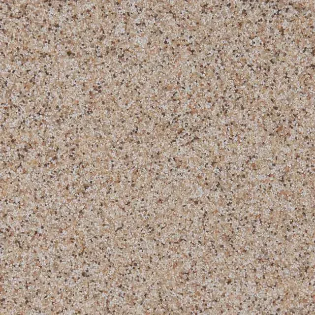 Speckled beige and brown textured surface, resembling sand or stone.