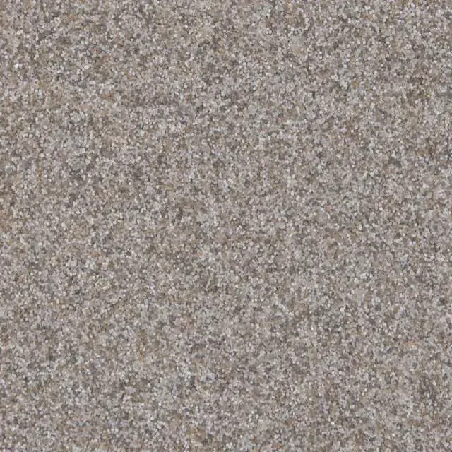 Close-up of a speckled gray-brown textured surface.