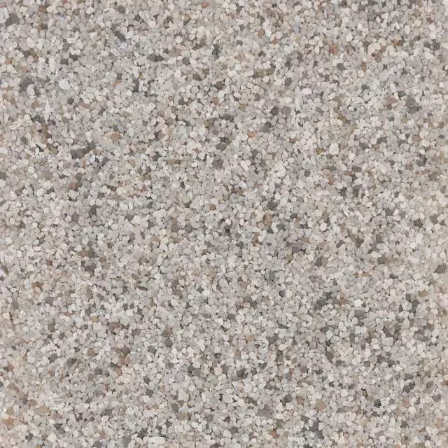 Close-up of a speckled gray and beige stone surface.