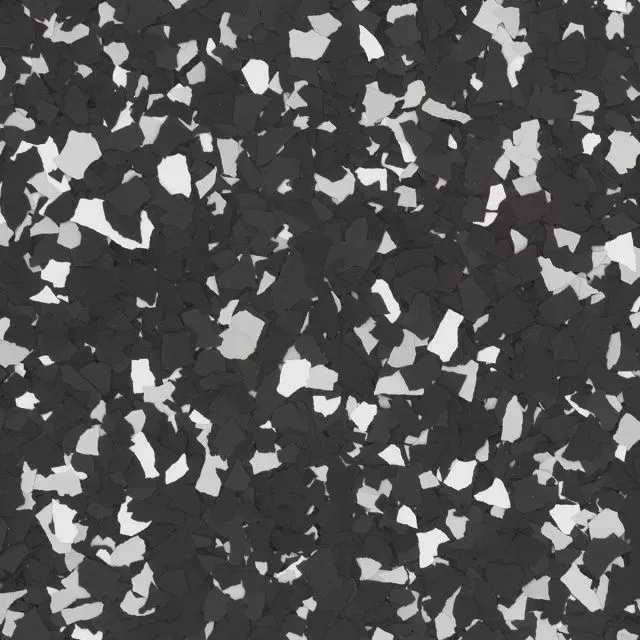 Black and gray speckled surface with scattered white fragments, like terrazzo or camouflage texture.