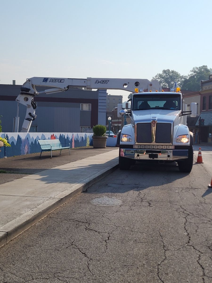 A Kenworth truck is parked on the side of the road