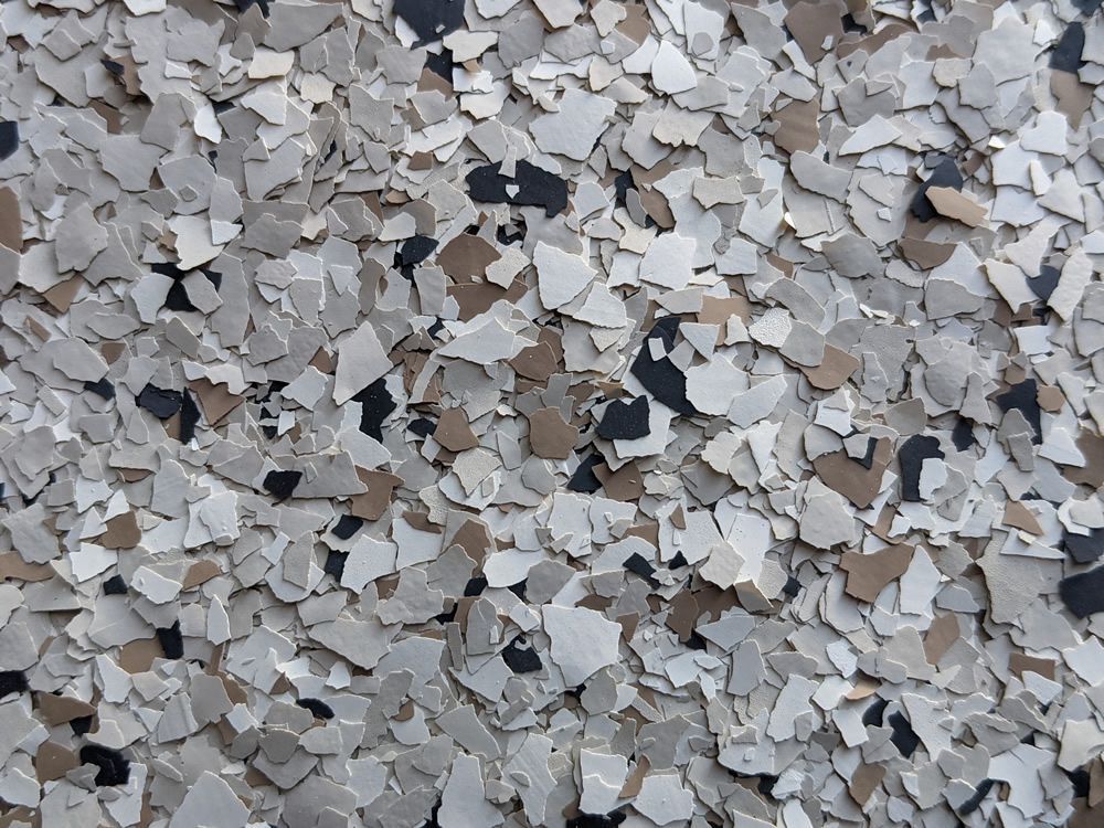Gray and white crushed stone or gravel texture filling the frame