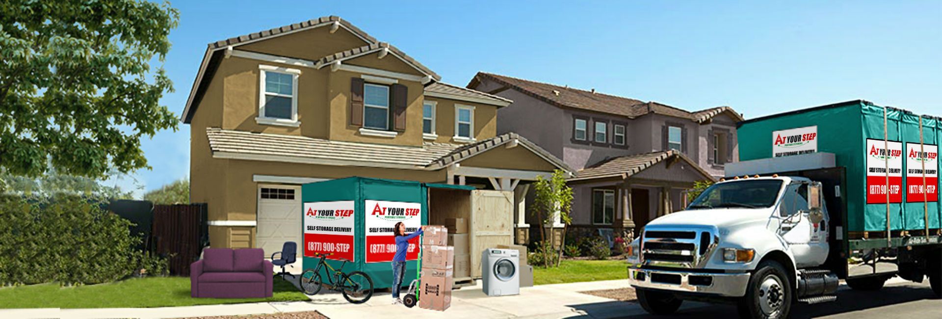 Moving truck and SUV outside a suburban house with boxes and a moving dolly in the driveway