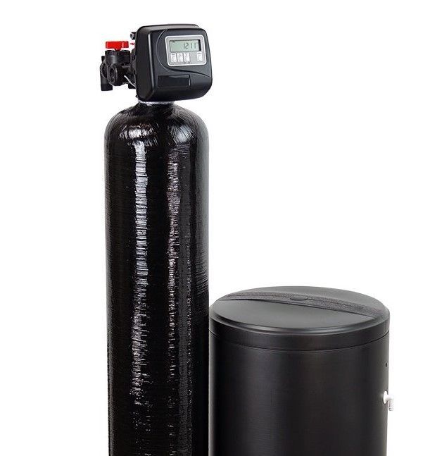 Black water softener tank with control valve next to a matching black brine tank on a white background