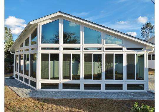 A large white house with a lot of windows