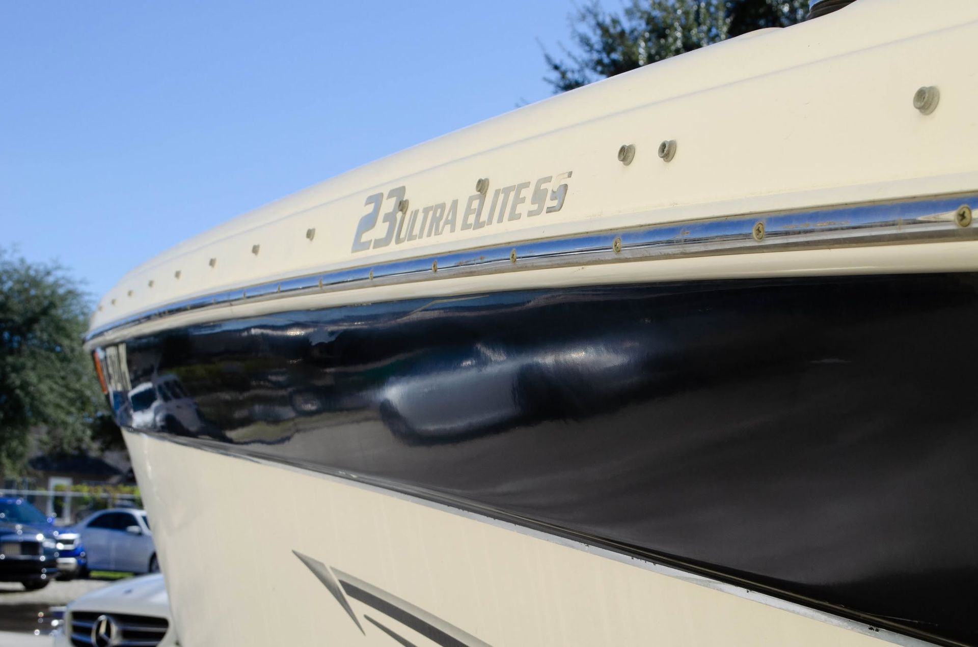 Close-up of a white and black boat hull with the name “Eternal Bliss” on the side.