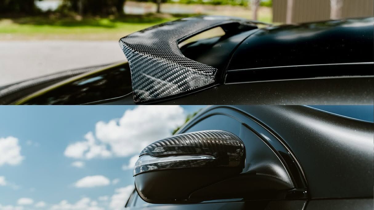 Close-up of a black sports car side mirror and hood with a carbon-fiber accent, shown in two views.