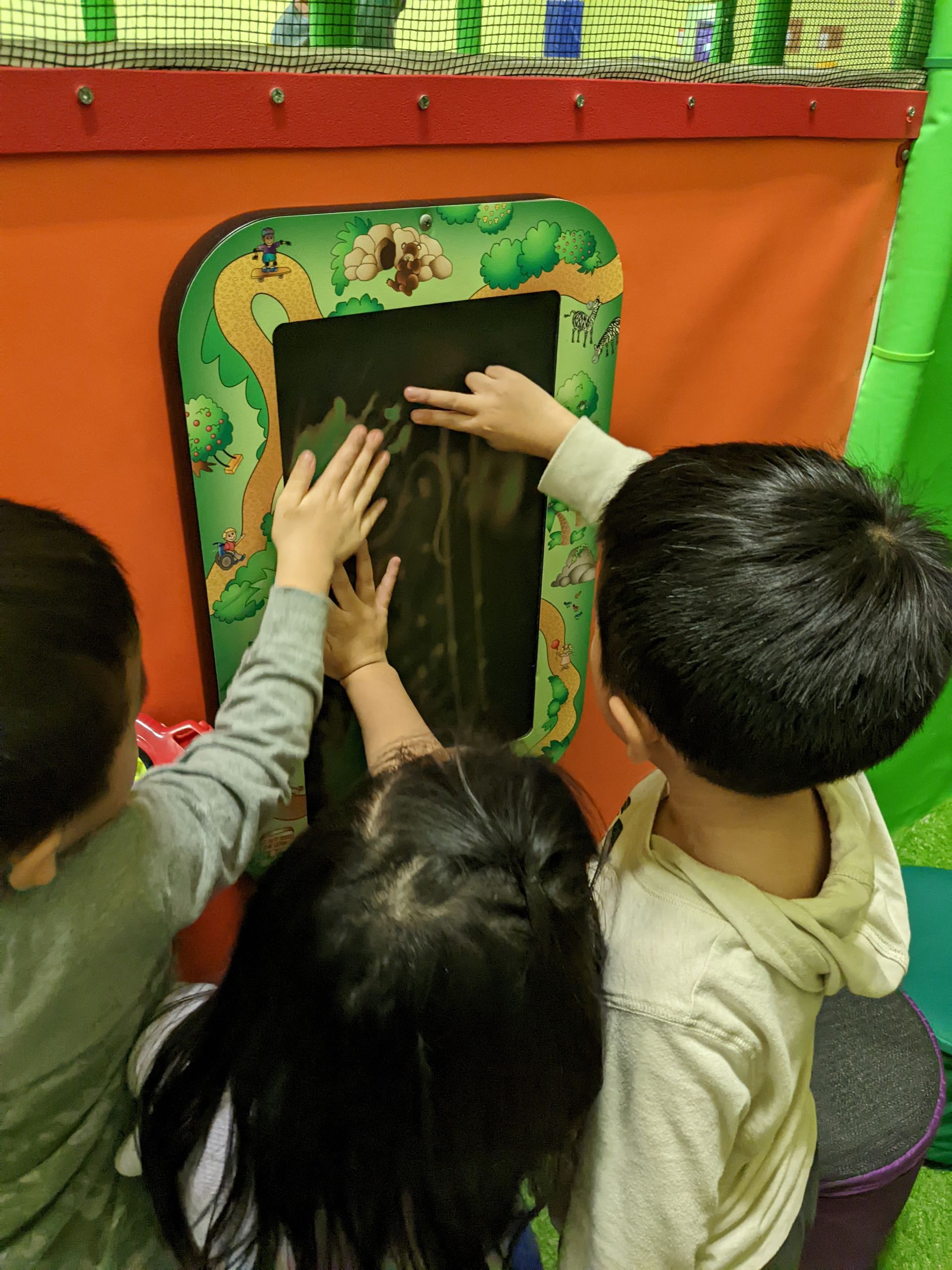 A group of children are playing in a playhouse.