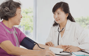 Senior citizen woman on a check-up with a doctor