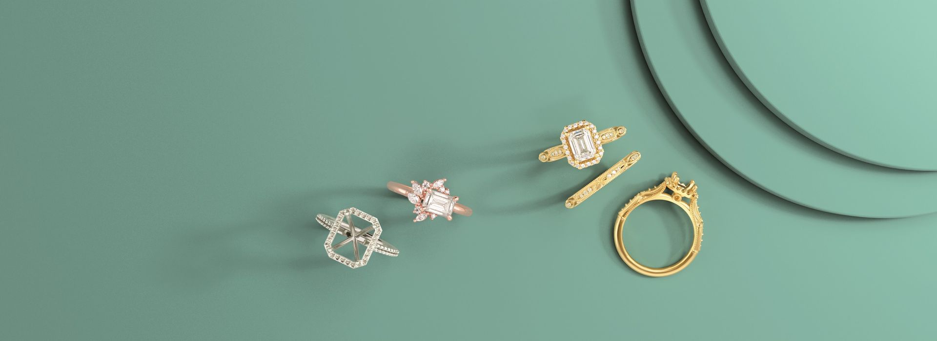 Five rings on a green surface with two concentric circles; one is an openwork knot-like design.