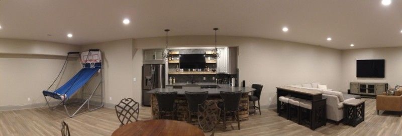 There is a basketball hoop in the middle of the room.