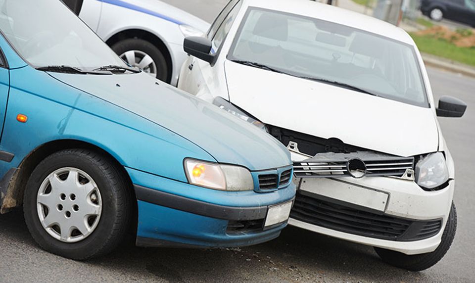 Car crash collision accident on an city road highway