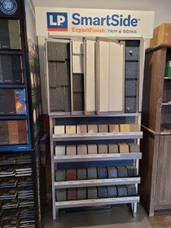 LP SmartSide trim and siding color samples on display at a store.