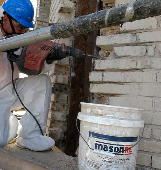 A man is using a drill