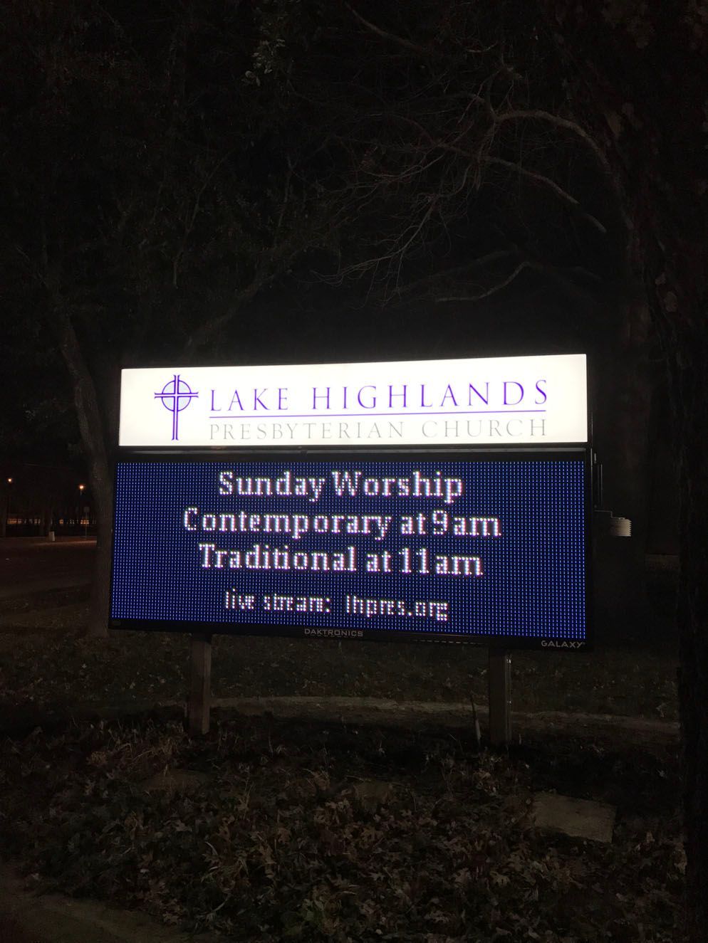 A sign for Lake Highlands church says Sunday worship contemporary at 9 am traditional at 11 am