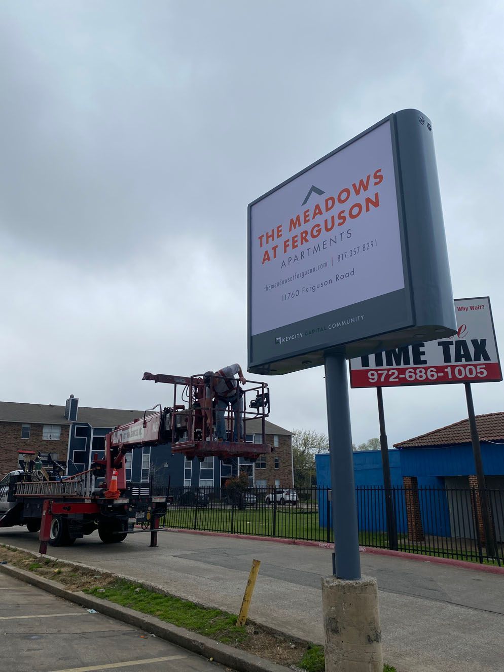 A sign that says 141 Meadows at Ferguson on it