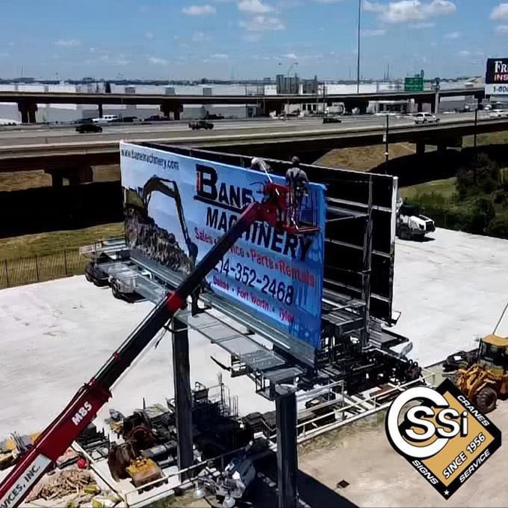 An aerial view of a billboard for bane machinery