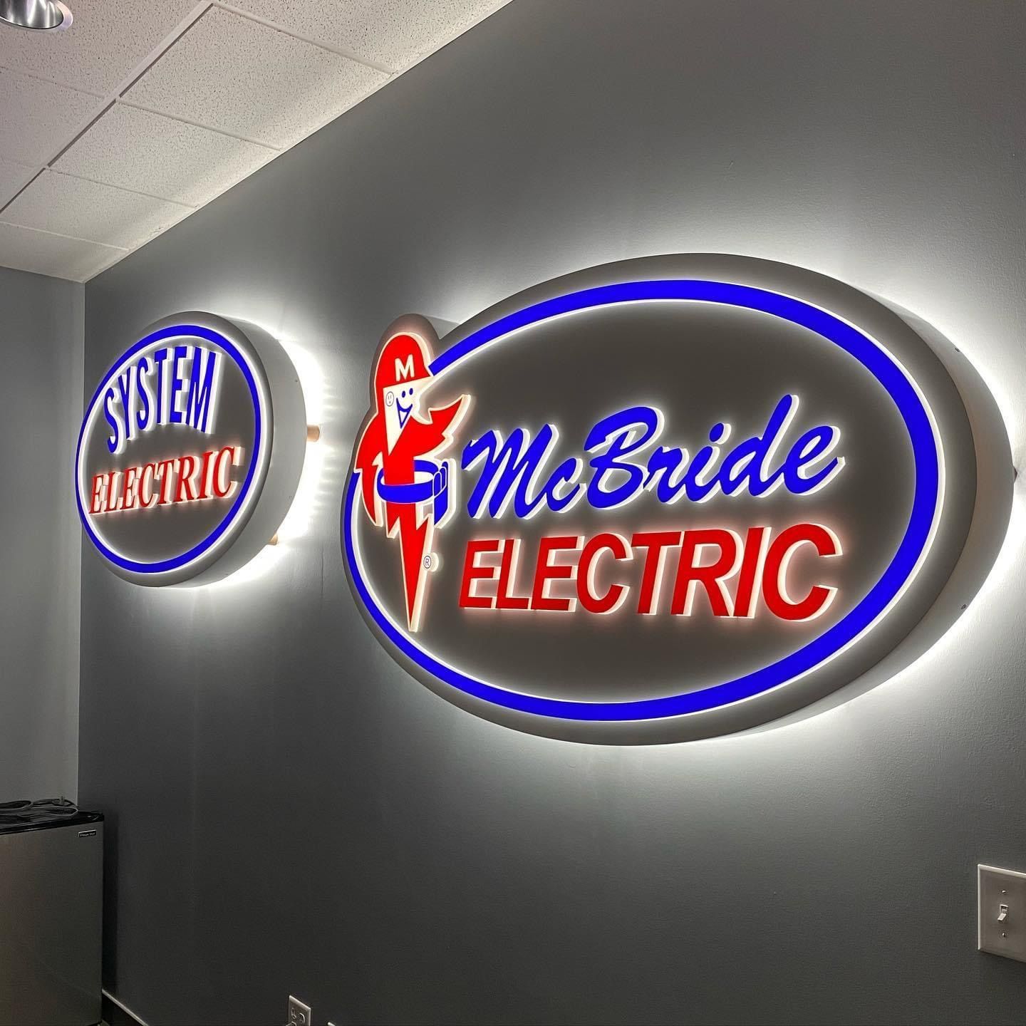 A sign that says mcbride electric on it