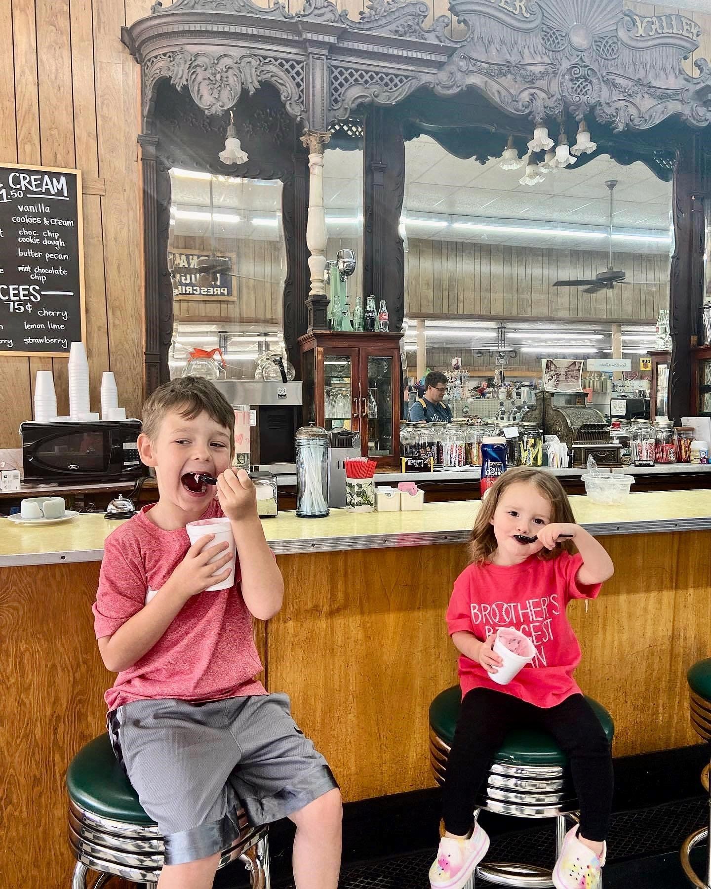 Two Kids Enjoying Ice Cream