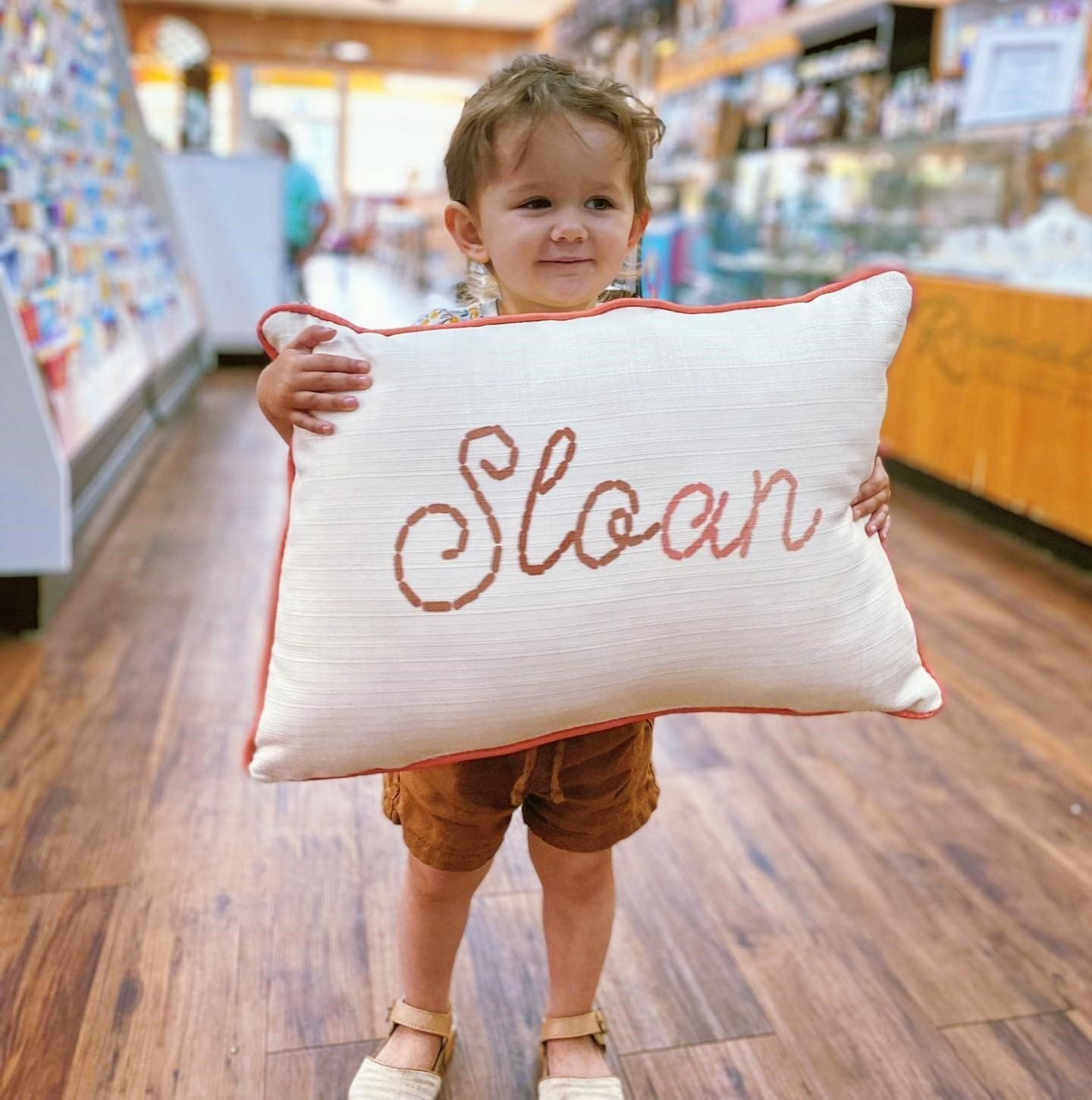 Baby Holding a Pillow