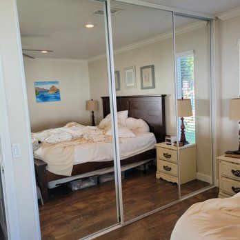 Sliding cabinet doors with mirror