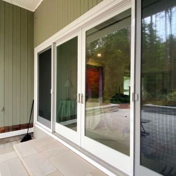 A porch with sliding glass doors