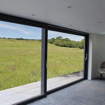 Large sliding door with a view of a field