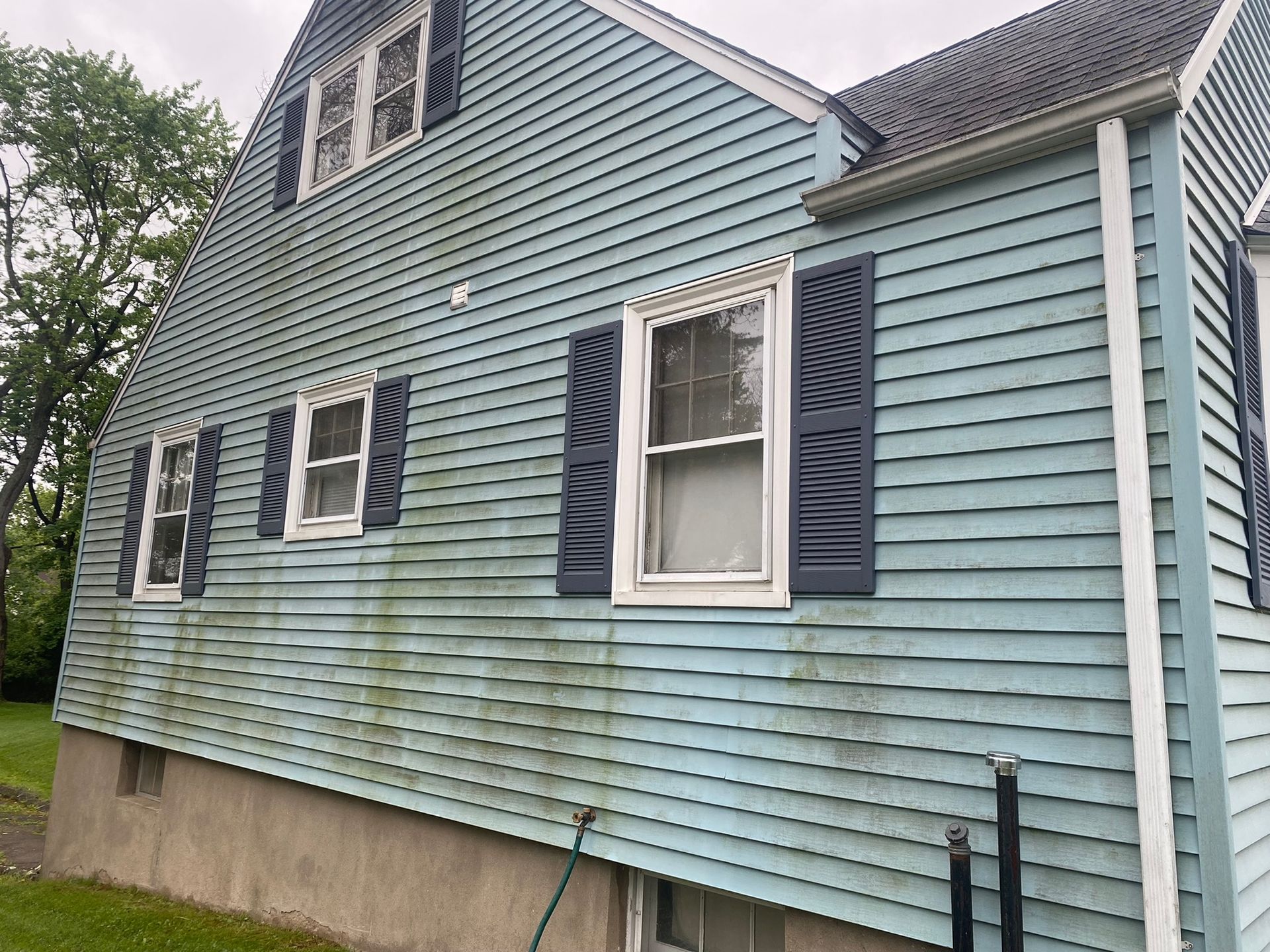 before cleaning siding