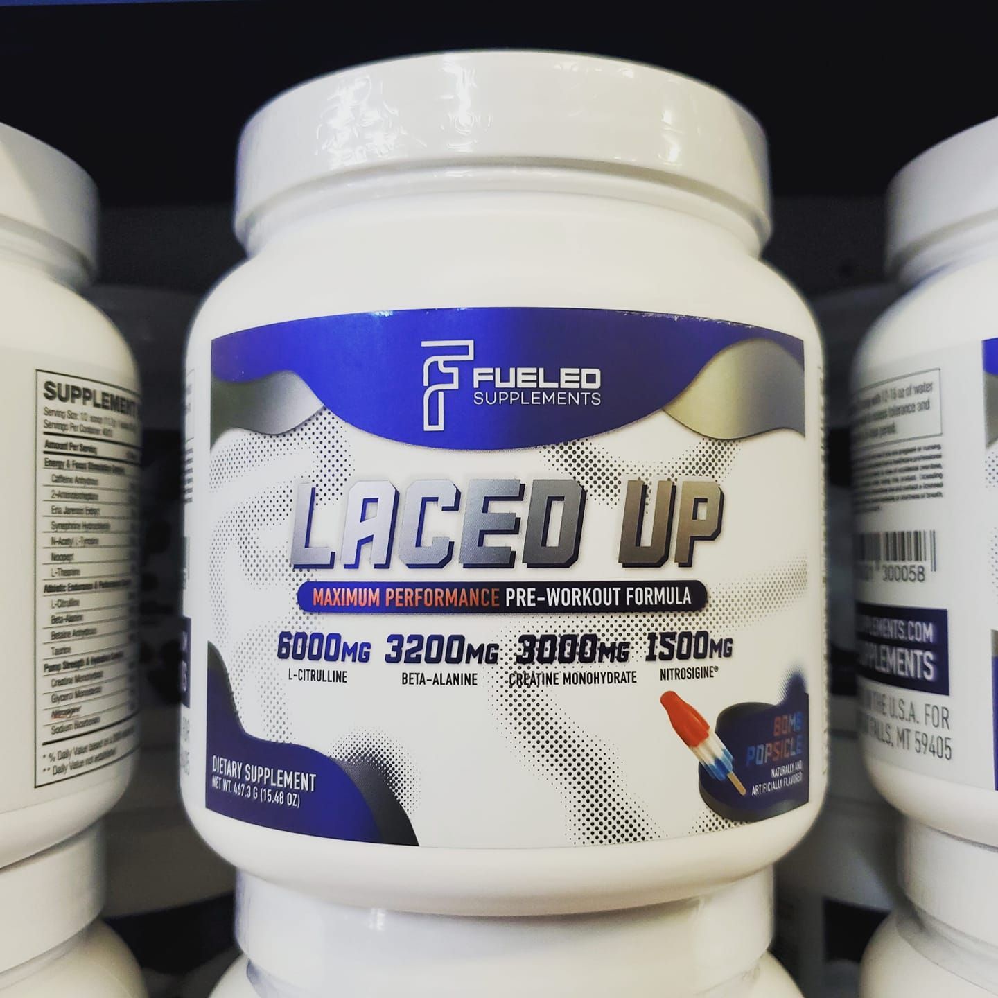 A jar of laced up sits on a shelf.