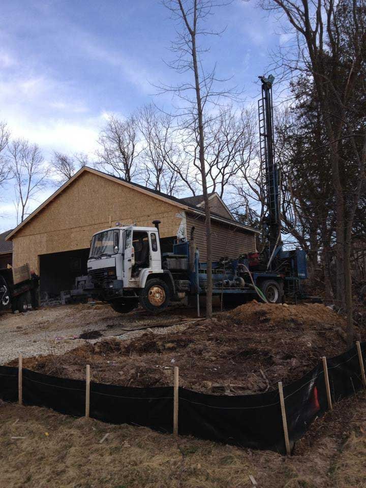 a truck is parked in front of a house