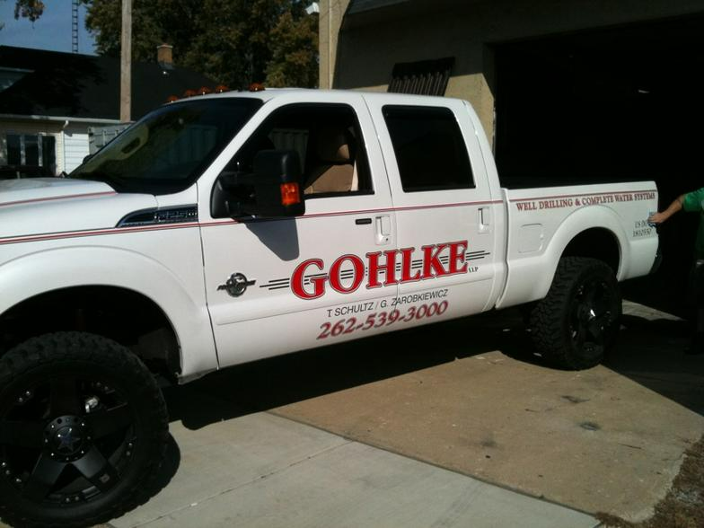a white truck with the word gohlke on the side