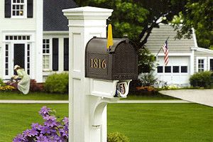 A mailbox in front of a house.