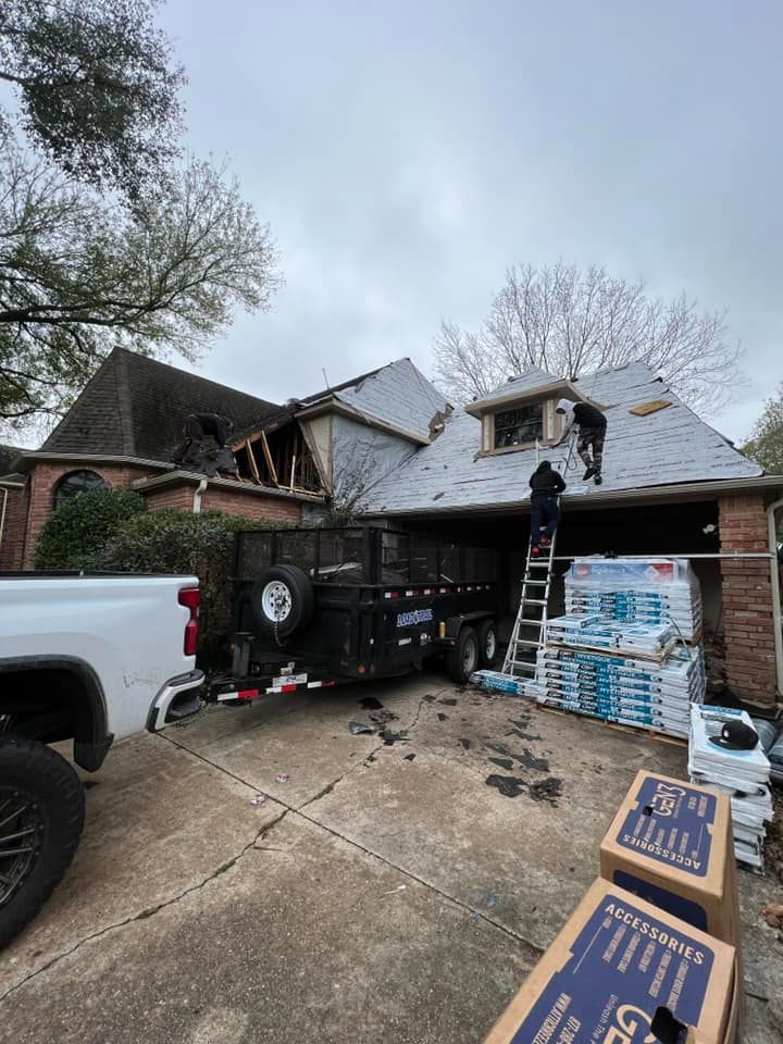 Roofers repairing a house with a damaged roof, trailer nearby with new shingles. Overcast day.